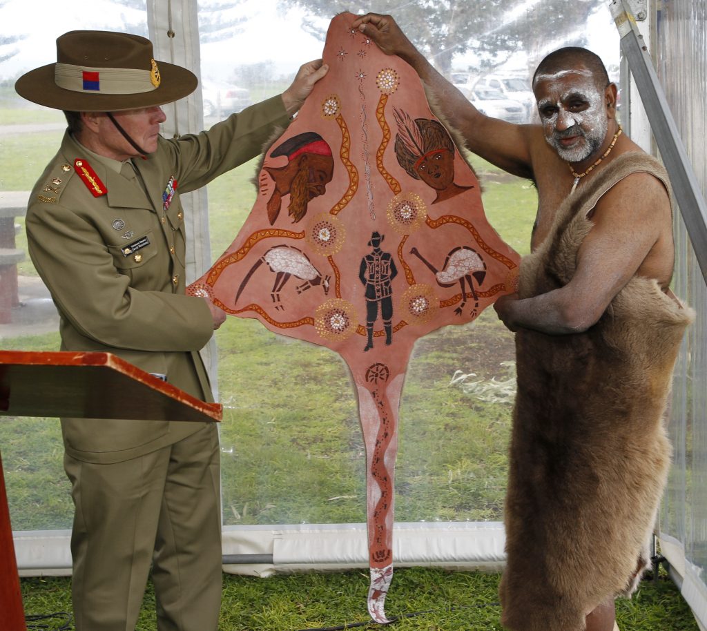 Chief of Army Lieutenant General David Morrison, AO is presented with a traditional kangaroo skin warrior's cloak by Uncle Karno Walker